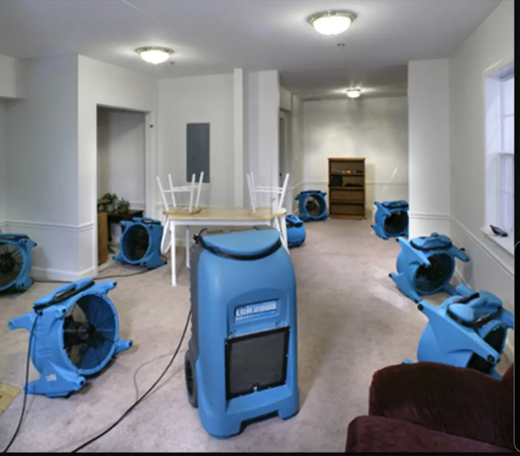 Air movers and dehumidifier setup for Water Extraction & Removal in Tupelo